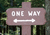 One way sign with a double ended arrow